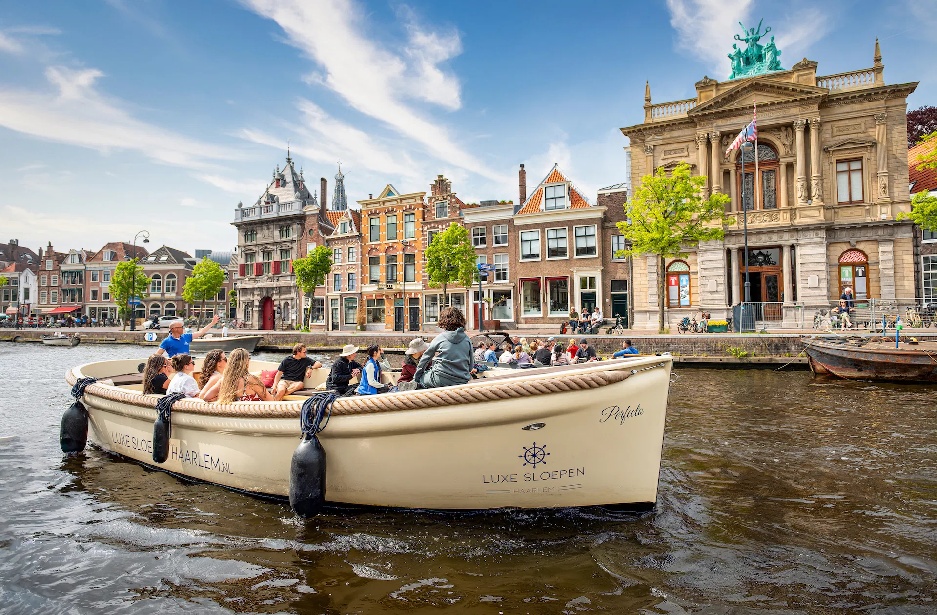 Cruise ship in the Canals of Haarlem with people